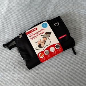 Brand new Skip Hop black portable diaper bag changing table bag